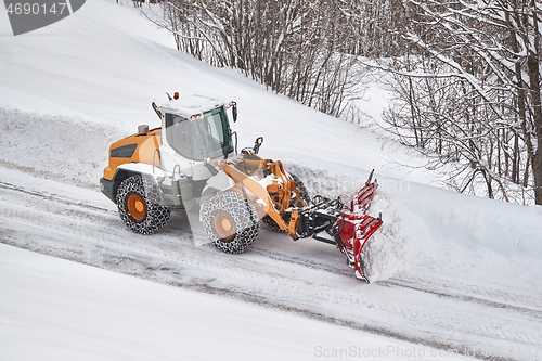 Image of Winter road clearing snowplow