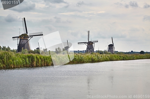 Image of Windmill beside a canal