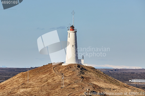 Image of Old White Lighthouse on a hill