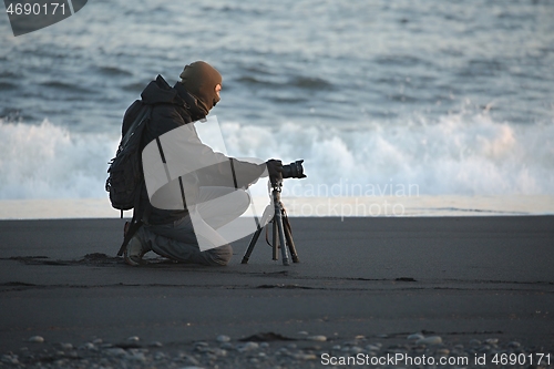 Image of Photographer with tripod