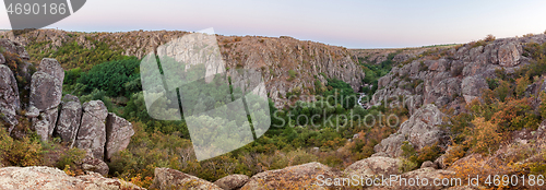 Image of Panoramic photo of stunning landscape with with canyon.