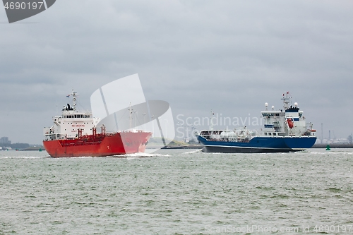 Image of Industrial ships sailing near Rotterdam