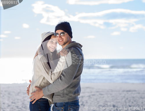 Image of Couple chating and having fun at beach bar