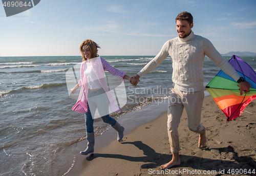 Image of Couple enjoying time together at beach