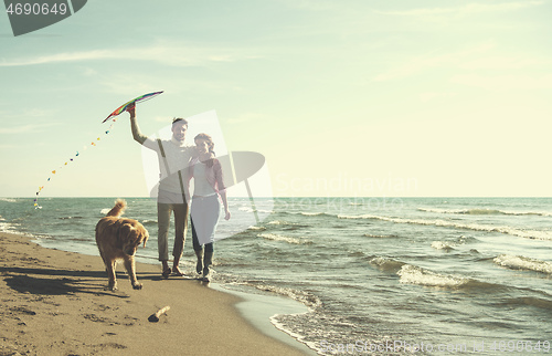 Image of happy couple enjoying time together at beach