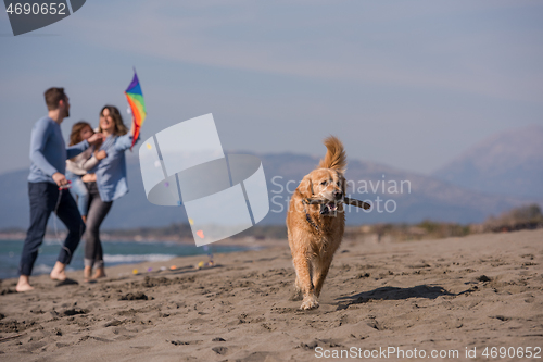 Image of happy young family enjoying vecation during autumn day