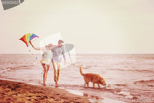 Image of happy couple enjoying time together at beach