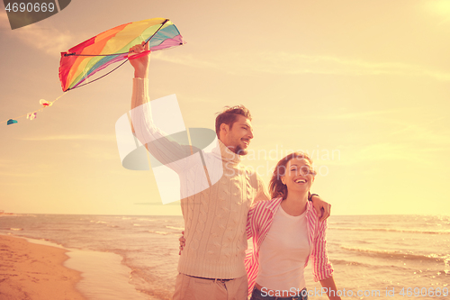 Image of Couple enjoying time together at beach