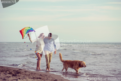 Image of happy couple enjoying time together at beach