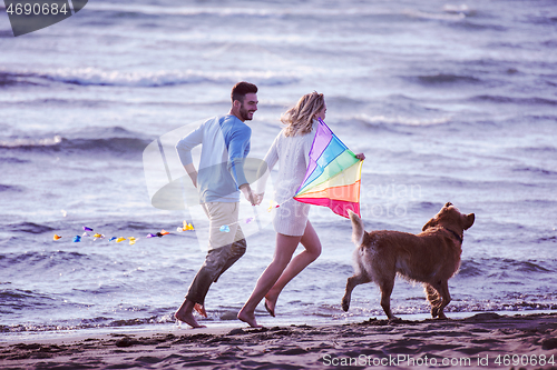 Image of happy couple enjoying time together at beach