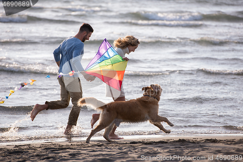 Image of happy couple enjoying time together at beach