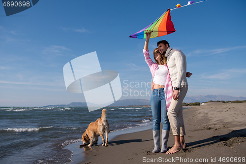 Image of happy couple enjoying time together at beach