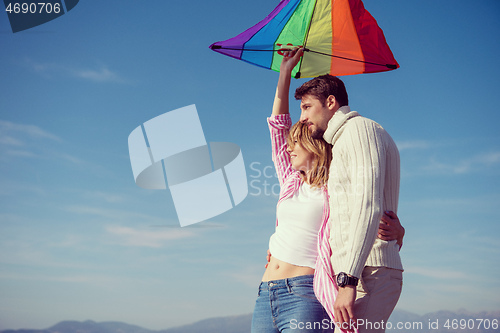 Image of Couple enjoying time together at beach