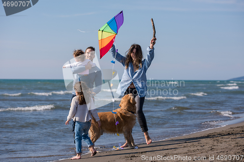 Image of happy young family enjoying vecation during autumn day