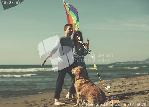 Image of happy couple enjoying time together at beach