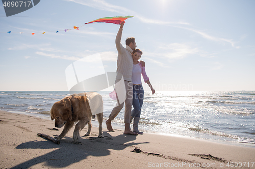 Image of happy couple enjoying time together at beach