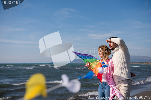 Image of Couple enjoying time together at beach