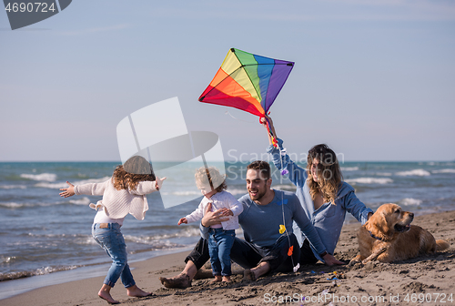 Image of happy young family enjoying vecation during autumn day