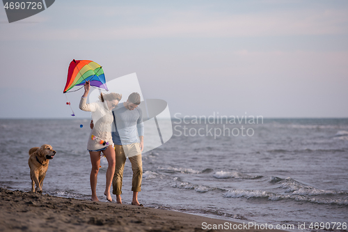 Image of happy couple enjoying time together at beach