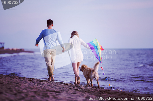 Image of happy couple enjoying time together at beach