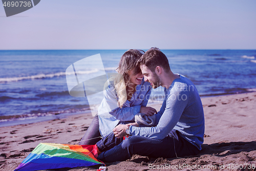 Image of Couple enjoying time together at beach