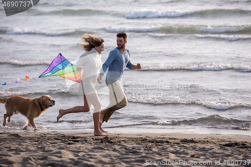 Image of happy couple enjoying time together at beach