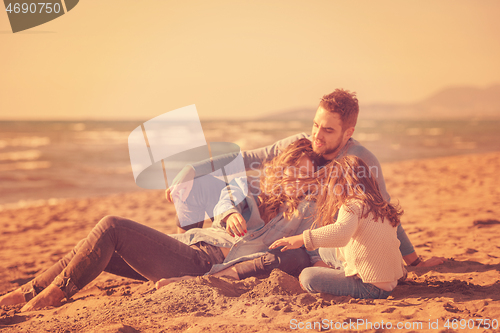 Image of Young family enjoying vecation during autumn