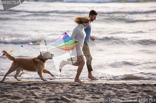 Image of happy couple enjoying time together at beach