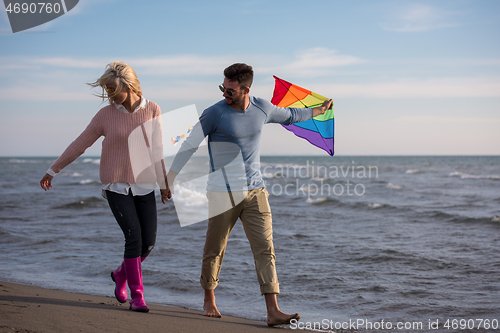 Image of Couple enjoying time together at beach