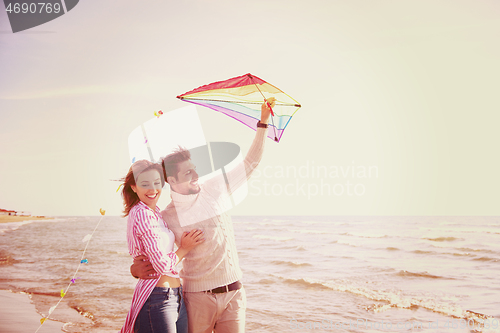 Image of Couple enjoying time together at beach