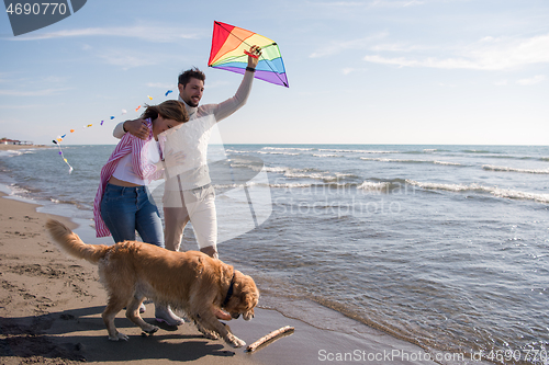 Image of happy couple enjoying time together at beach