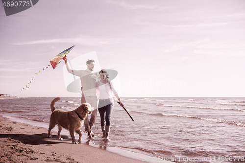 Image of happy couple enjoying time together at beach