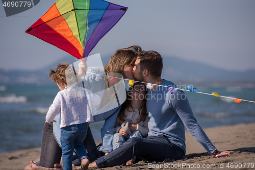 Image of happy family enjoying vecation during autumn day