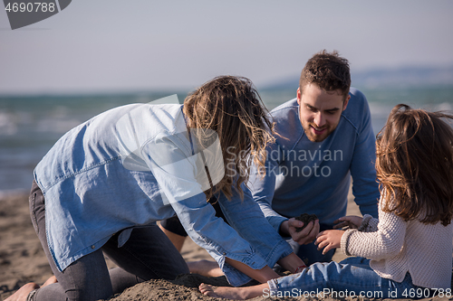 Image of Young family enjoying vecation during autumn