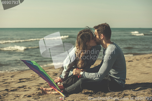 Image of Couple enjoying time together at beach