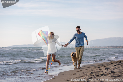 Image of happy couple enjoying time together at beach