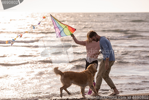 Image of happy couple enjoying time together at beach