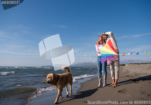 Image of happy couple enjoying time together at beach