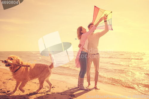 Image of happy couple enjoying time together at beach