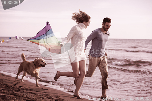 Image of happy couple enjoying time together at beach