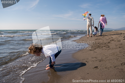 Image of happy family enjoying vecation during autumn day