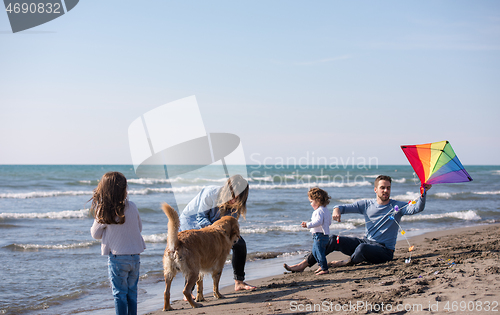 Image of happy young family enjoying vecation during autumn day