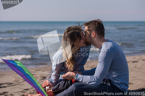 Image of Couple enjoying time together at beach