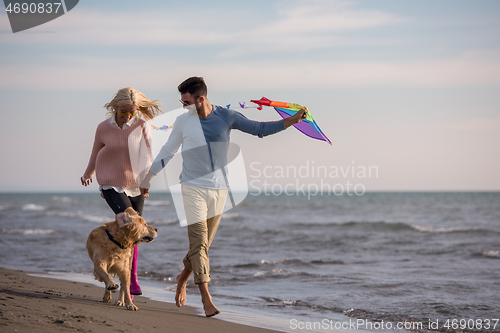 Image of happy couple enjoying time together at beach