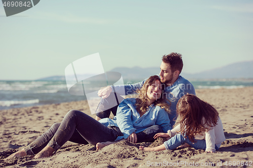 Image of Young family enjoying vecation during autumn