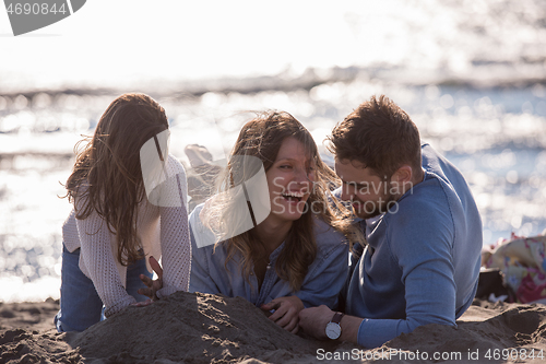 Image of Young family enjoying vecation during autumn