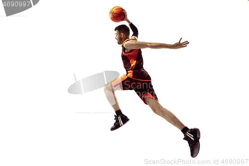 Image of Full length portrait of a basketball player with ball
