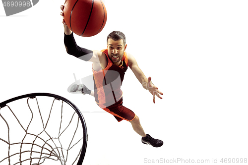 Image of Full length portrait of a basketball player with ball