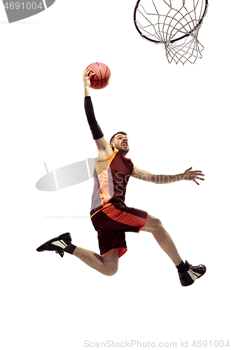 Image of Full length portrait of a basketball player with ball