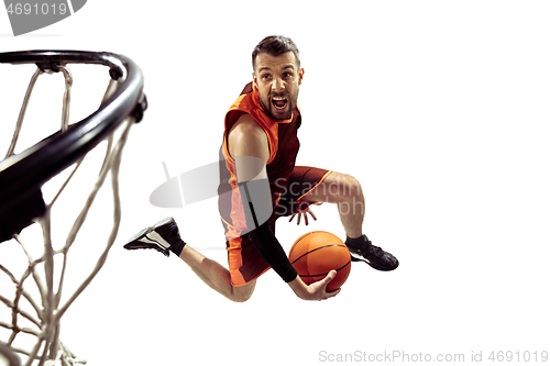 Image of Full length portrait of a basketball player with ball